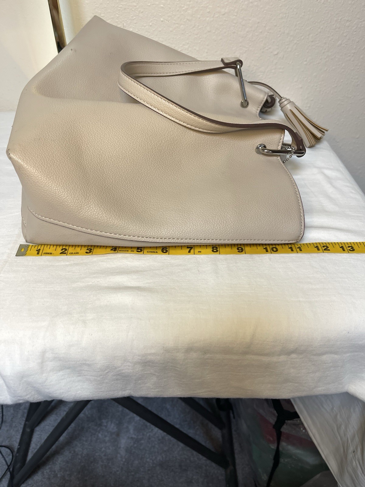 Anne Klein Taupe Vegan Pebbled Texture Tote with Lion and Tassel Charms