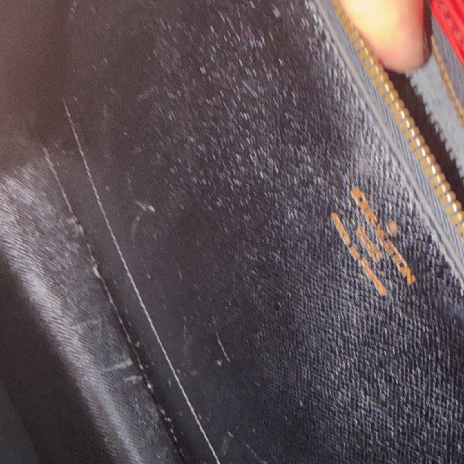 Louis Vuitton Red Epi Monceau 28 Handbag in textured leather/gold-tone hardware