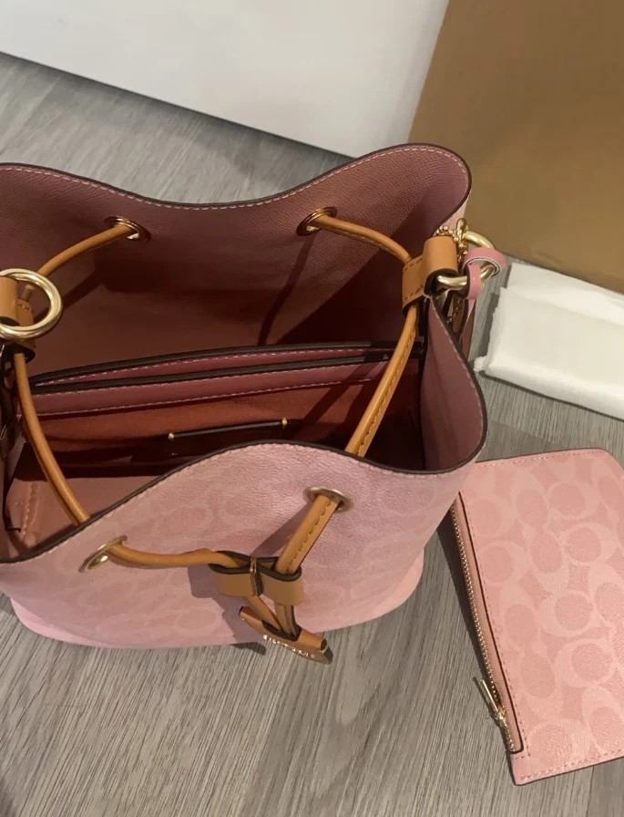 Coach CEA23 Rowan Bucket Bag In Signature Canvas With Charms Powder Pink Outlet+
