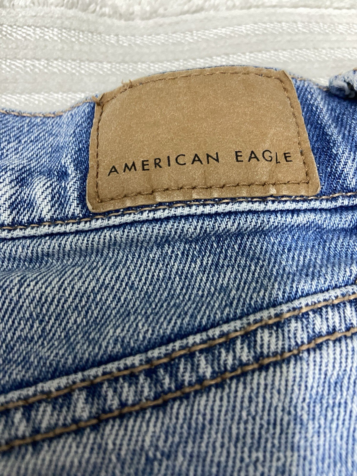 American Eagle Strigid Women’s High Rise Straight Distressed Light Wash Jeans 2