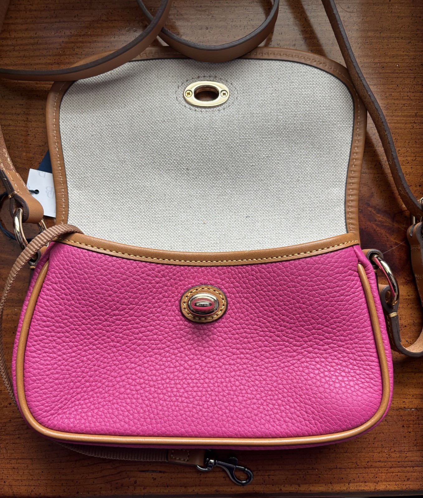 Dooney & Bourke Pebble Grain Turnlock Crossbody 22 in Fuchsia, new with tags
