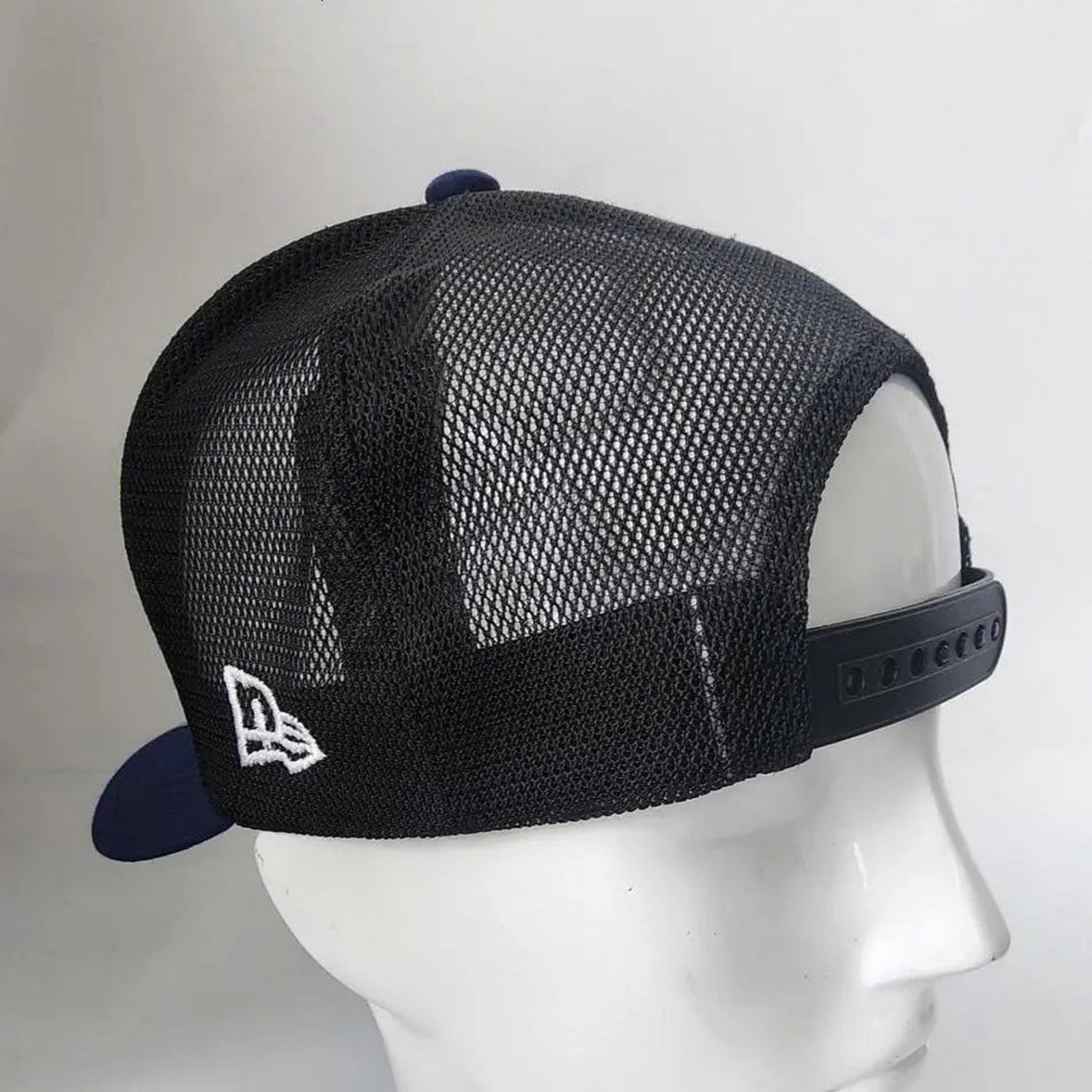 Four Seasons Hotel Embroidered 9FORTY Trucker Hat Black Mesh Snapback Cap