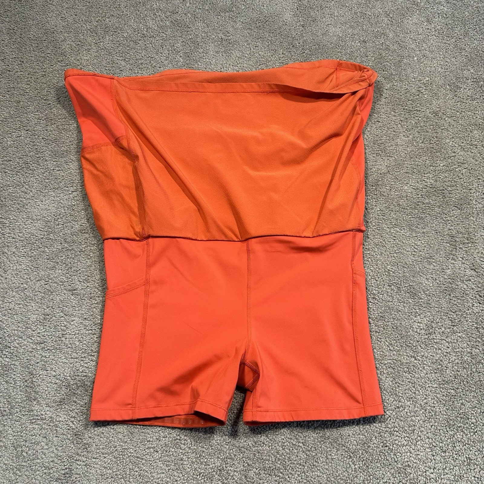 ATHLETA Action Skort in Dobby 14.5 Womens Small Orange Pockets Stretch Athletic