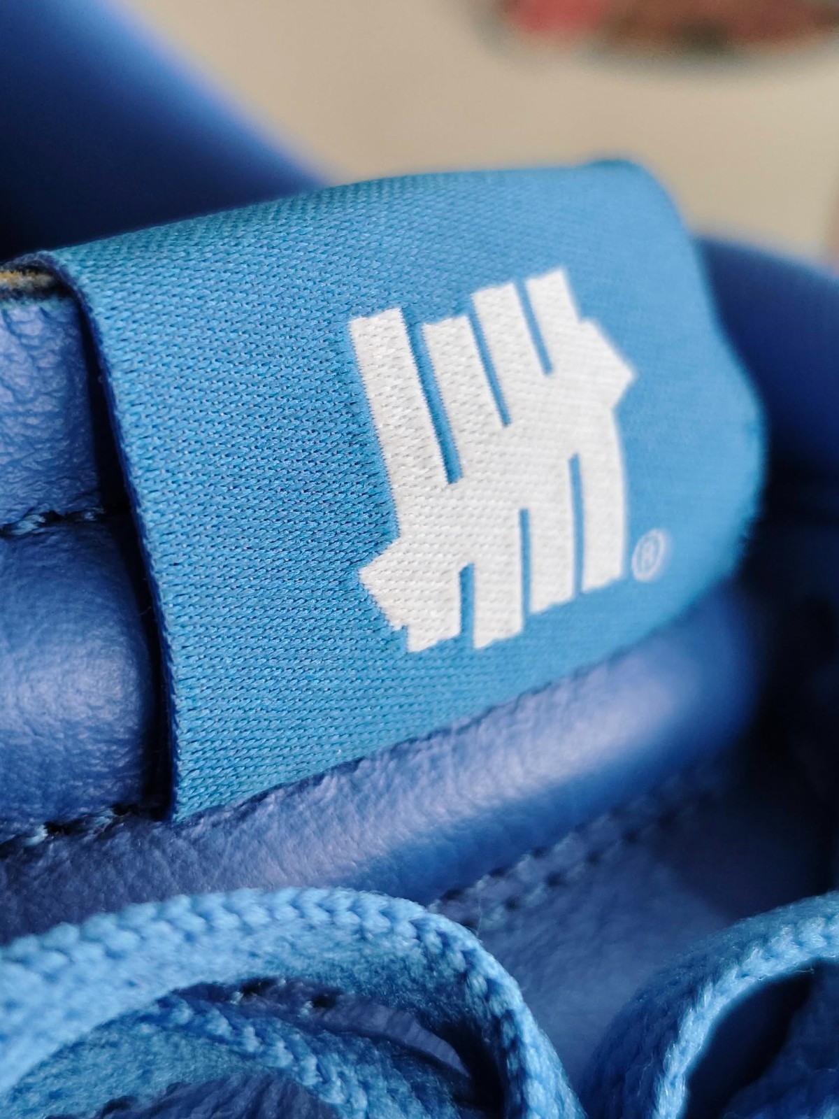 UNDEFEATED’s “Dunk vs. AF-1” Collection Grows With This Snakeskin- Dunk Low