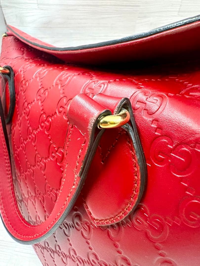 GUCCI Shoulder Bag Guccissima Red Leather Size: W11.4xH9.8 in. Strap: 43.3″