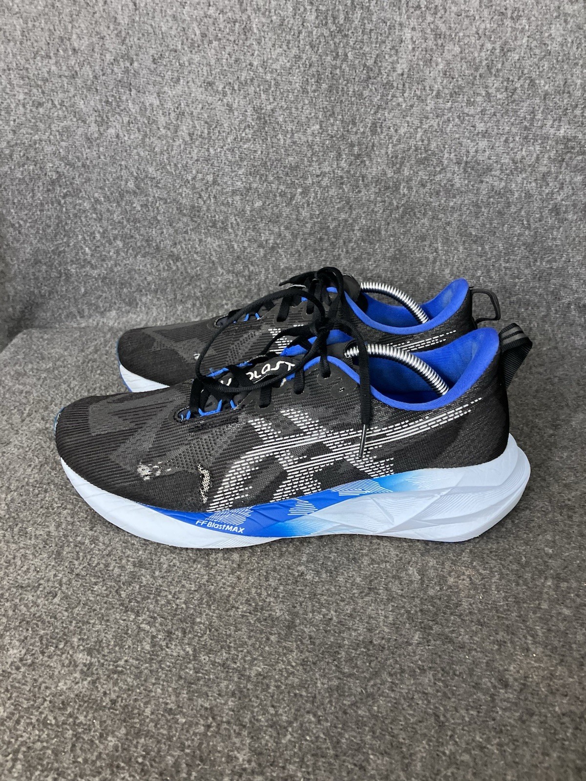 ASICS Novablast 5 Mens 11 Black Blue Running Shoes Sneakers HOLES