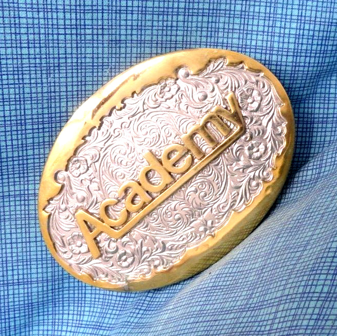 Academy Sports Promo Belt Buckle Ornate Floral Scroll Brass Vtg Koleaco .QRT979