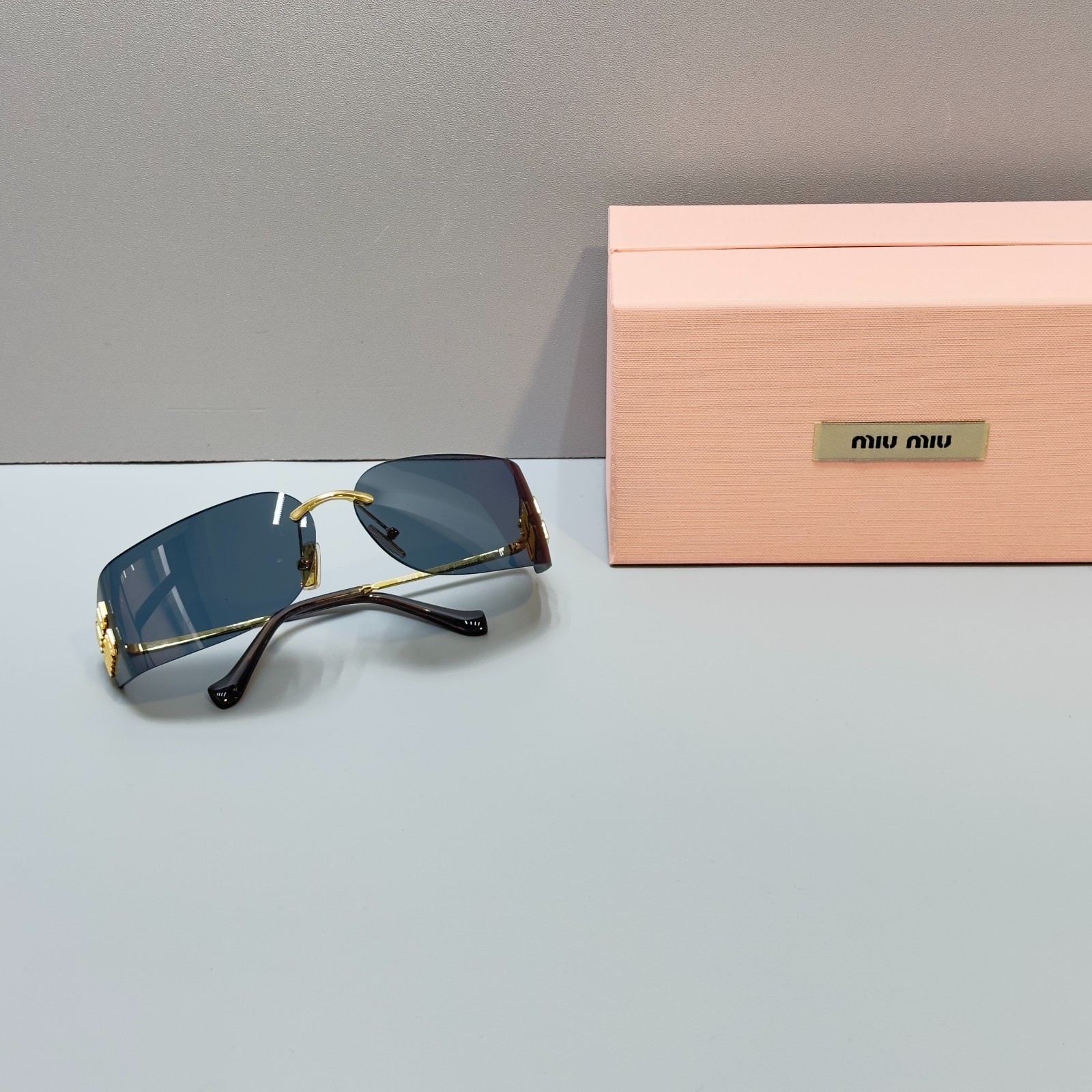 Miu Miu MU A51S Shield Sunglasses Gold Frame Black Lens Logo Rimless New W/Box