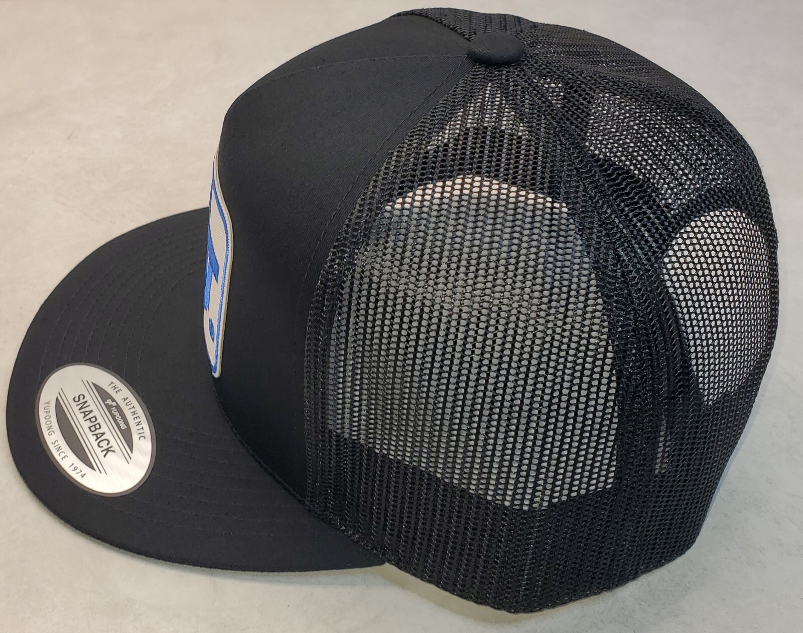 Colt Patch on Yupoong Trucker Hat YP Classic 6006 Snapback Black/Black