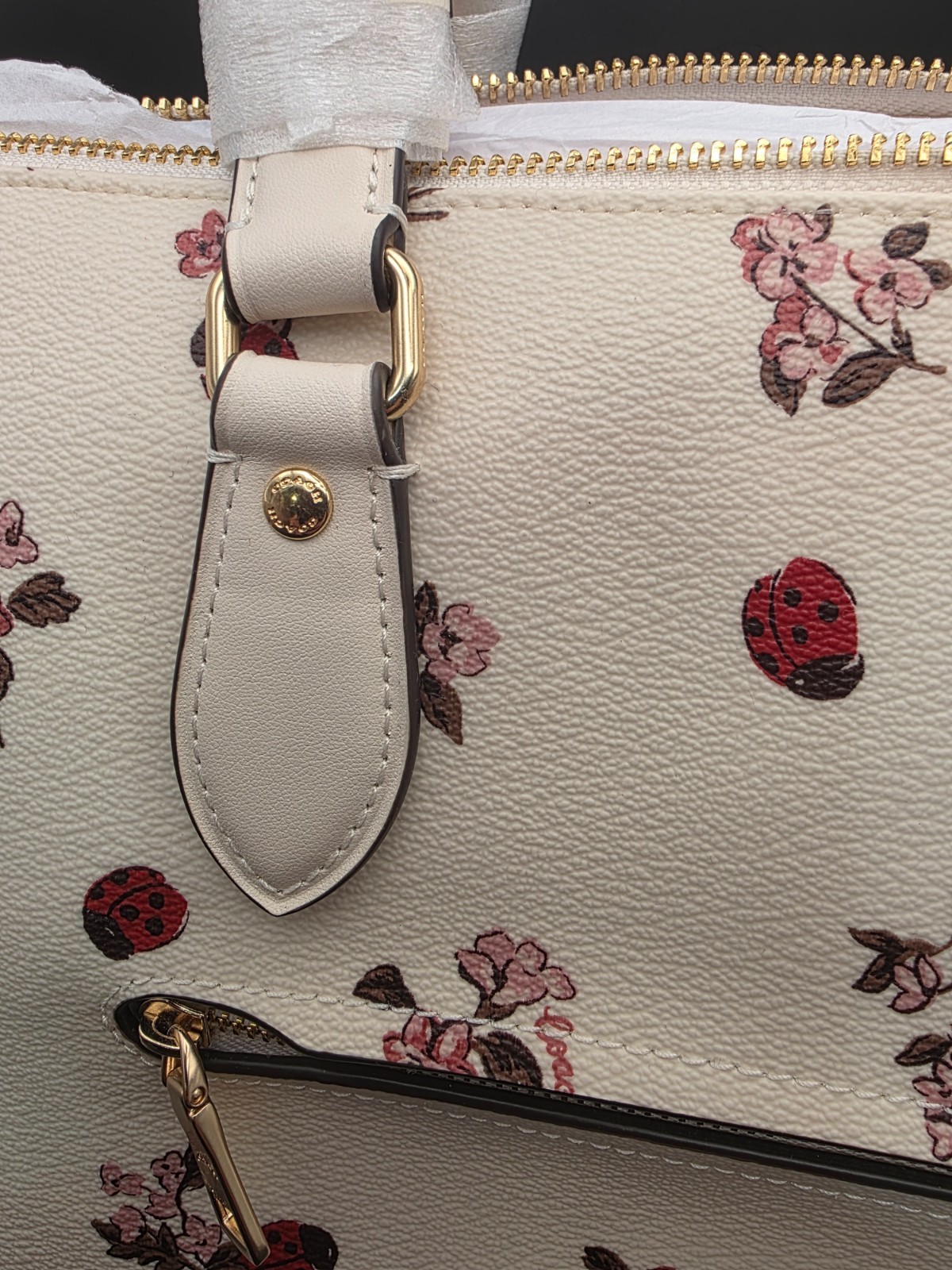 NEW COACH GALLERY TOTE WITH LADYBUG FLORAL PRINT (SCUFF MARKS BACK)