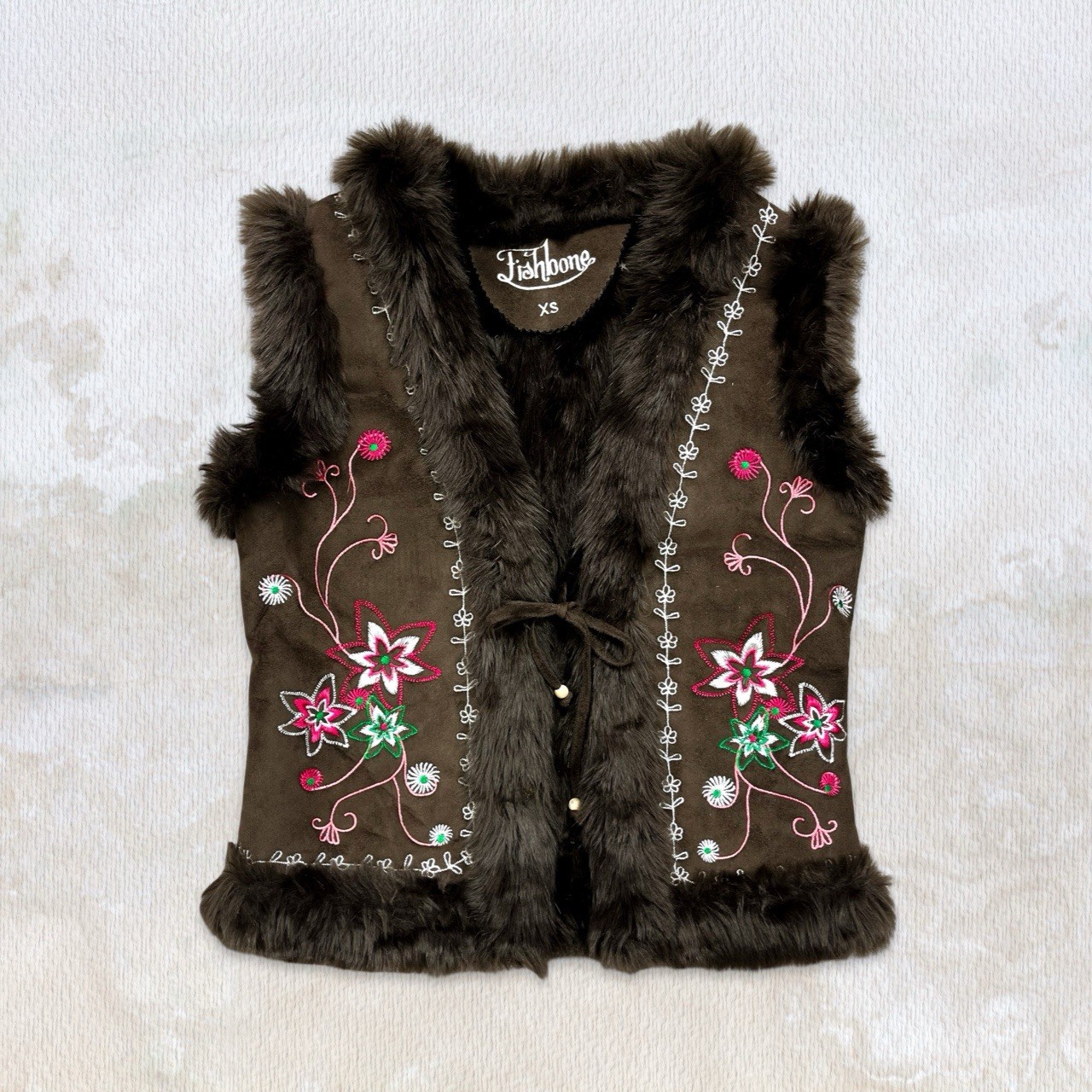 The ultimate Y2K boho chic embroidered faux fur vest