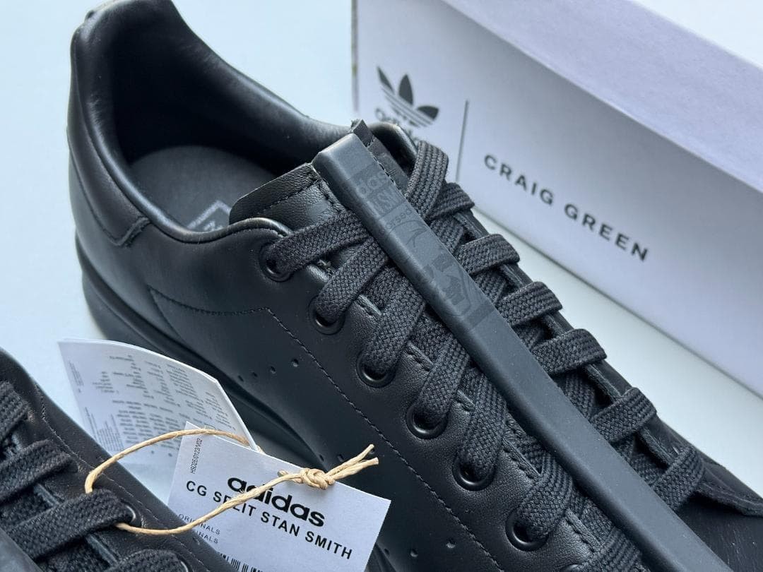 A classic split in half Collaboration Stan Smith black 10