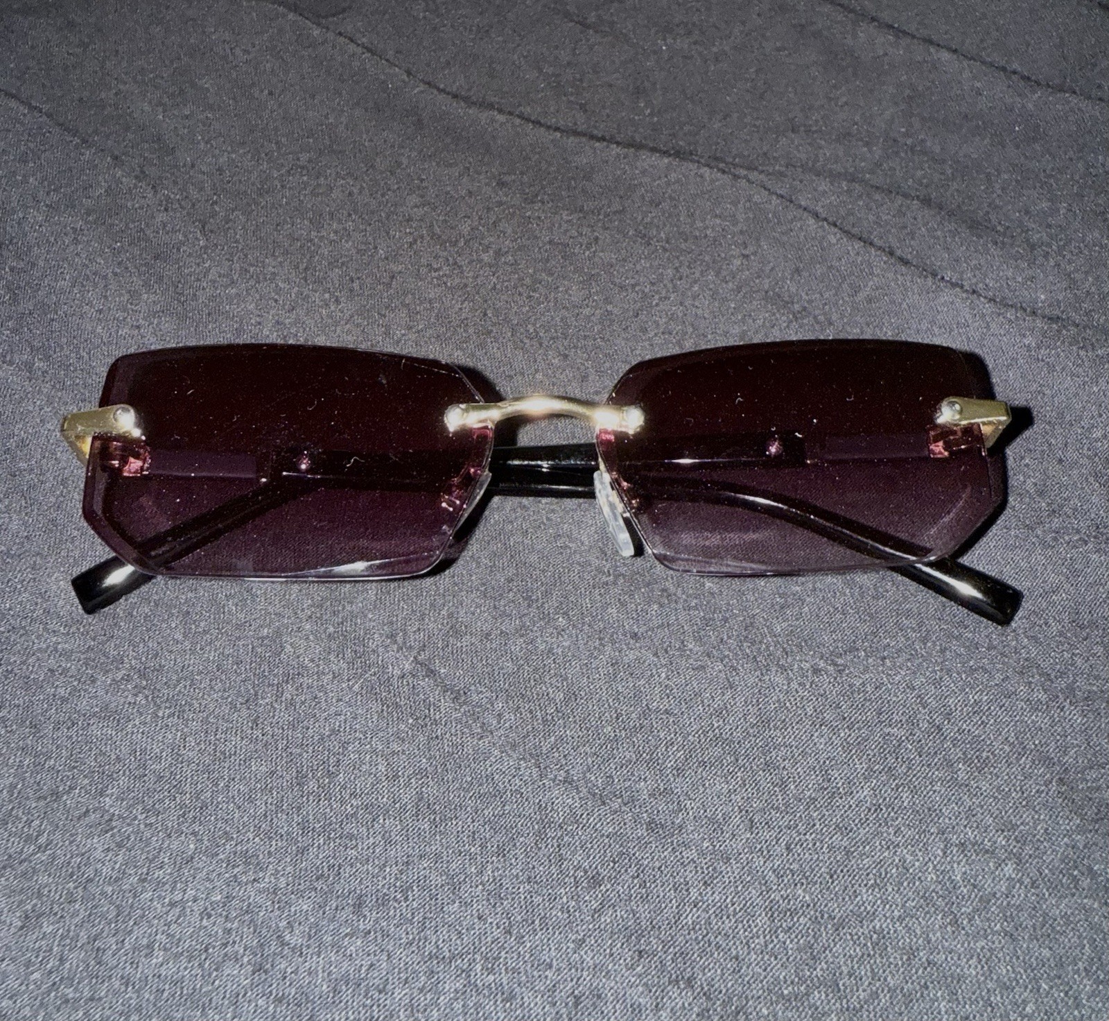 Rimless Rectangle Purple Tinted Lens Sunglasses Gold Frame Black Arms