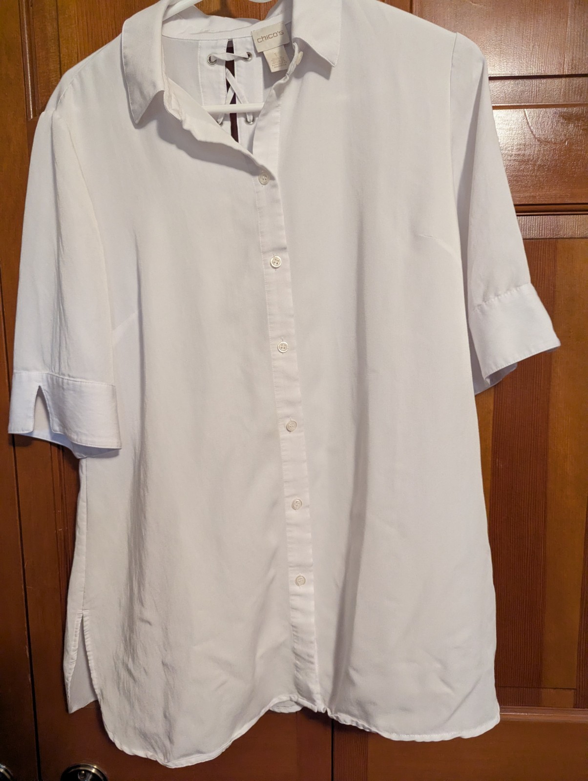 Chicos White Linen blend blouse with open back design, size 1 good condition