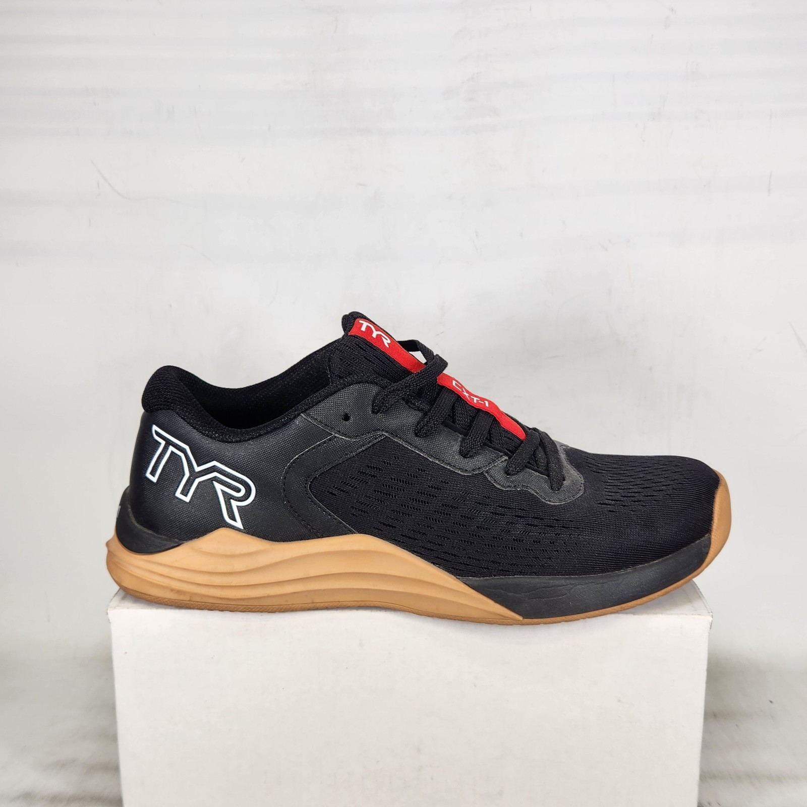 9.5 MEN / 11 WOM – TYR CXT-1 Trainer – Black / Red / Gum Sole