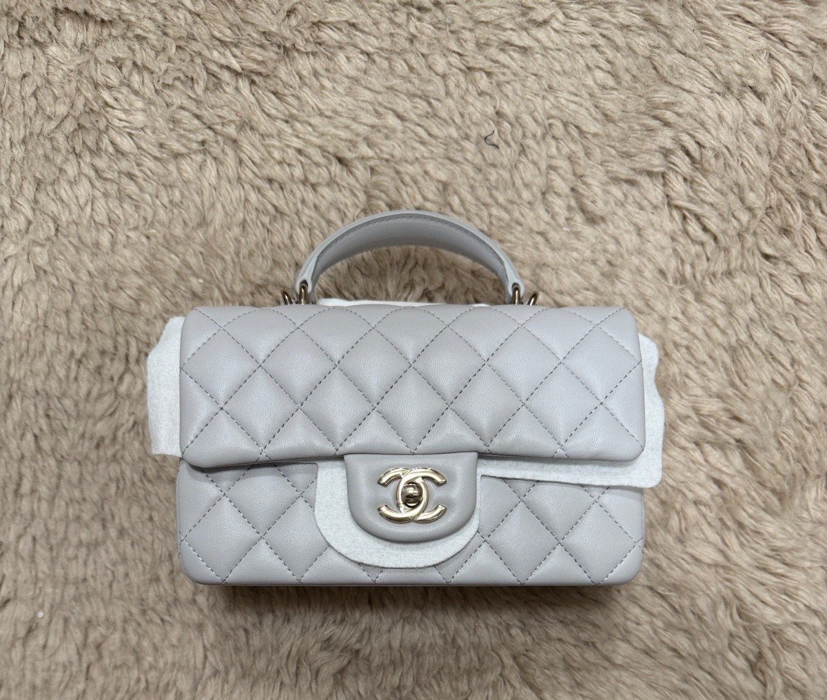 Never used! Chanel gray Mini Flap Bag with Top Handle