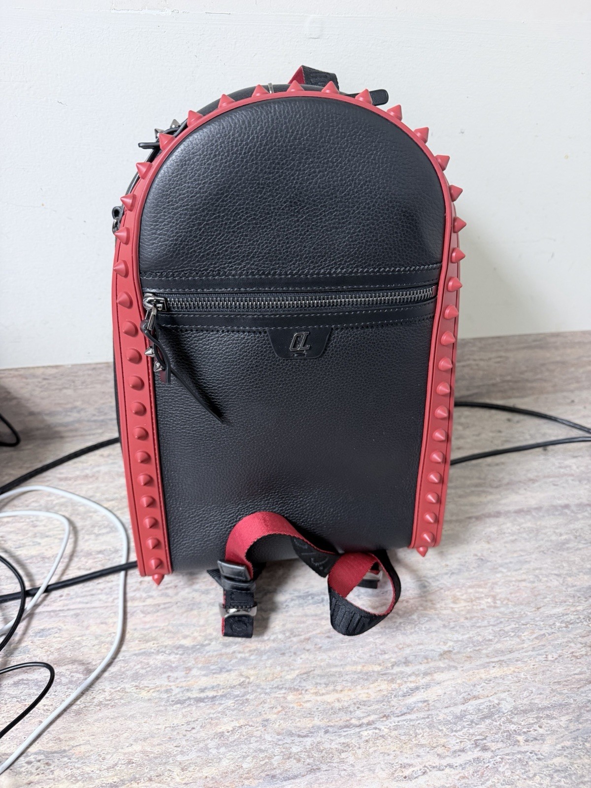 CHRISTIAN LOUBOUTIN MEN’S RED & BLACK LEATHER BACKPACK (NEW WITHOUT TAGS).
