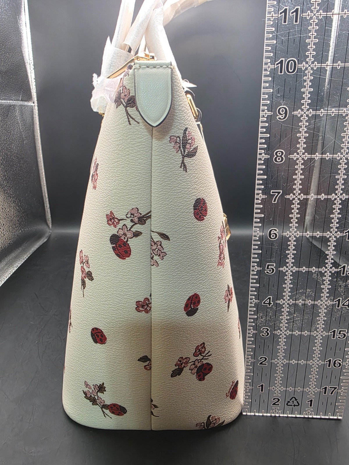 NEW COACH GALLERY TOTE WITH LADYBUG FLORAL PRINT (SCUFF MARKS BACK)