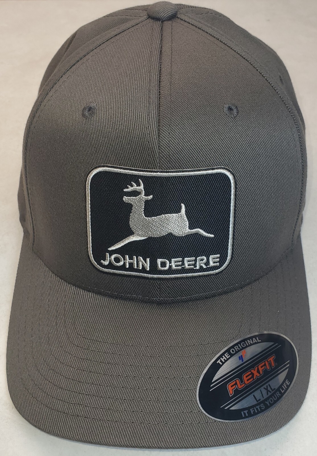 John Deere Black Patch on Flexfit Style 6277 / Charcoal – L/XL 7 1/8″ – 7 5/8″
