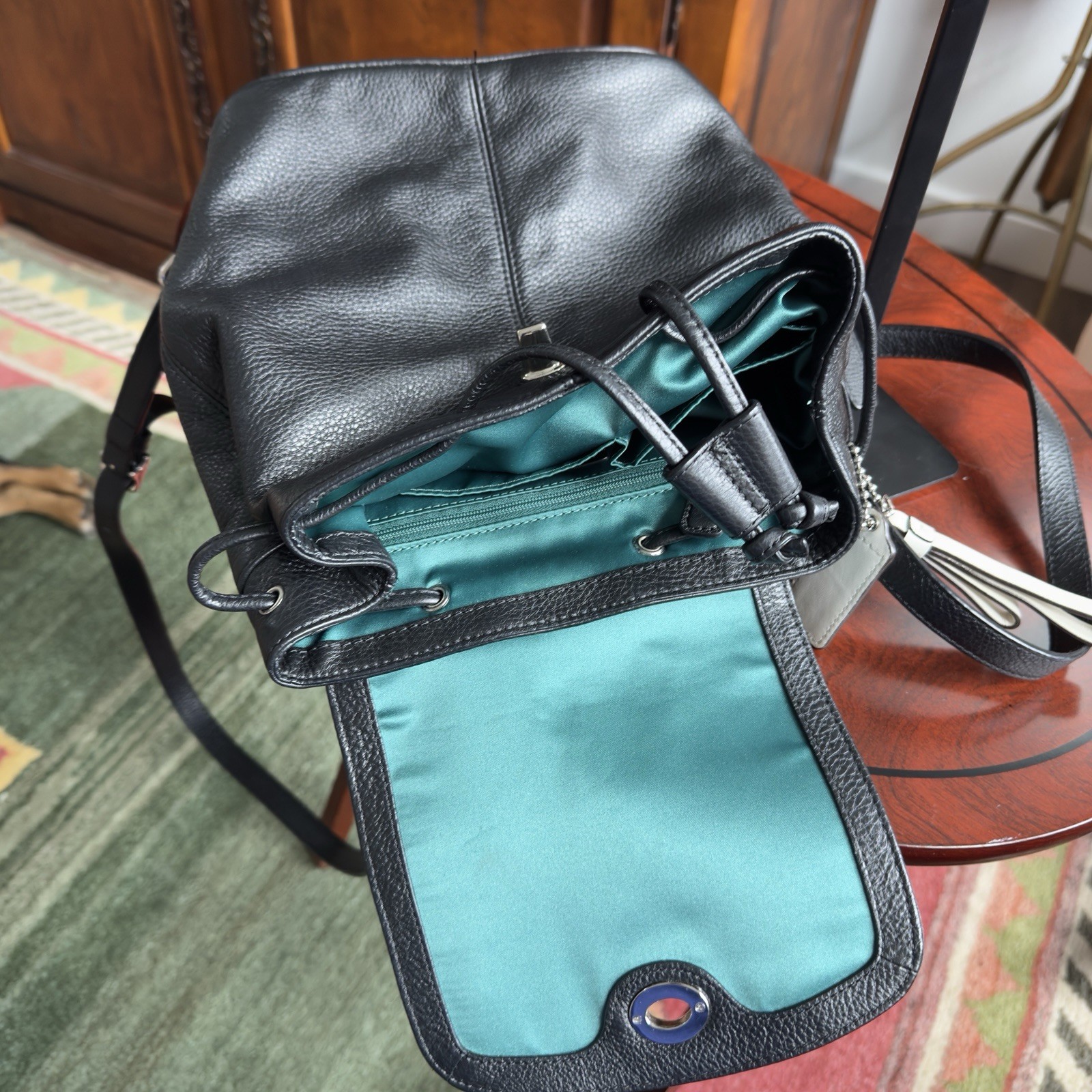 Coach F24385 Black Pebbled Leather Turnlock Drawstring Backpack