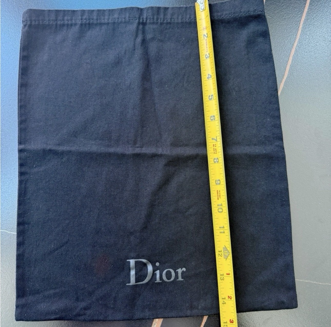 Dior original dust bag in black approximately 14.5 x 12 inches.