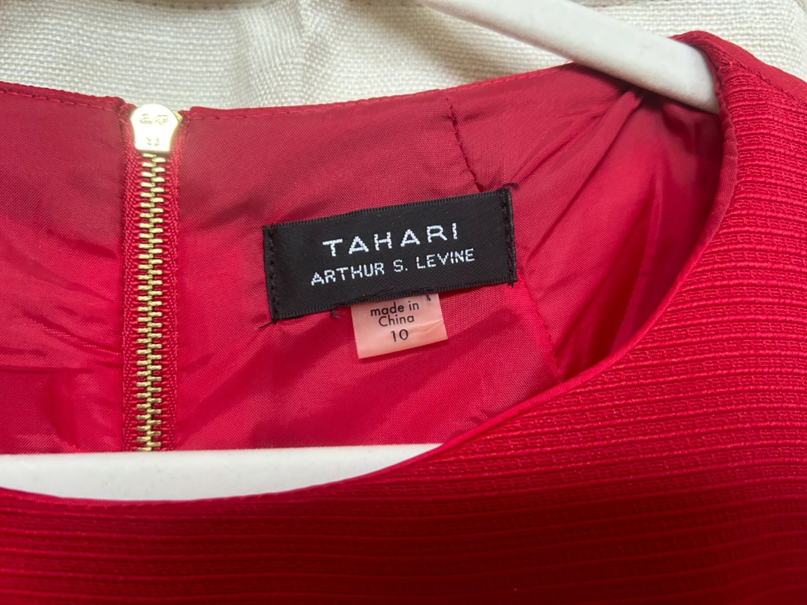 Tahari Arthur S. Levine sleeveless fit-and-flare dress in a vibrant cherry red c