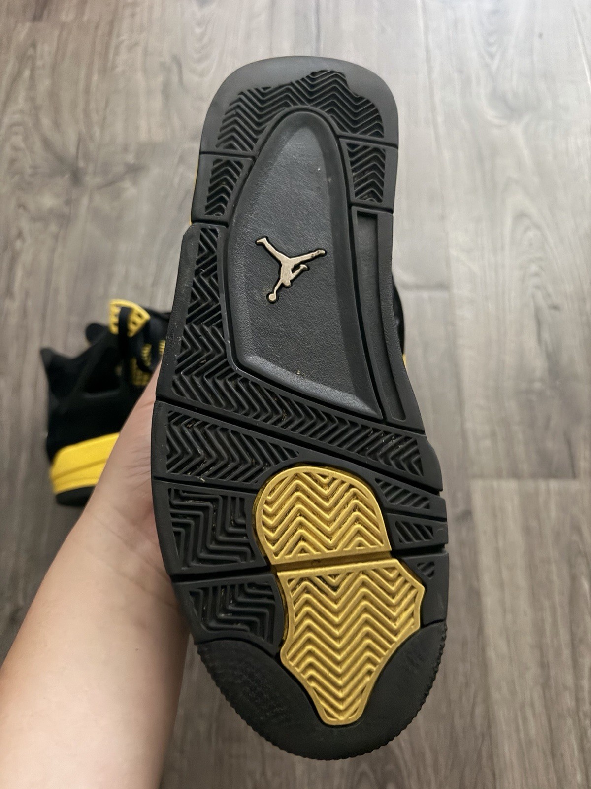 Size 9.5 – Jordan 4 Retro Thunder