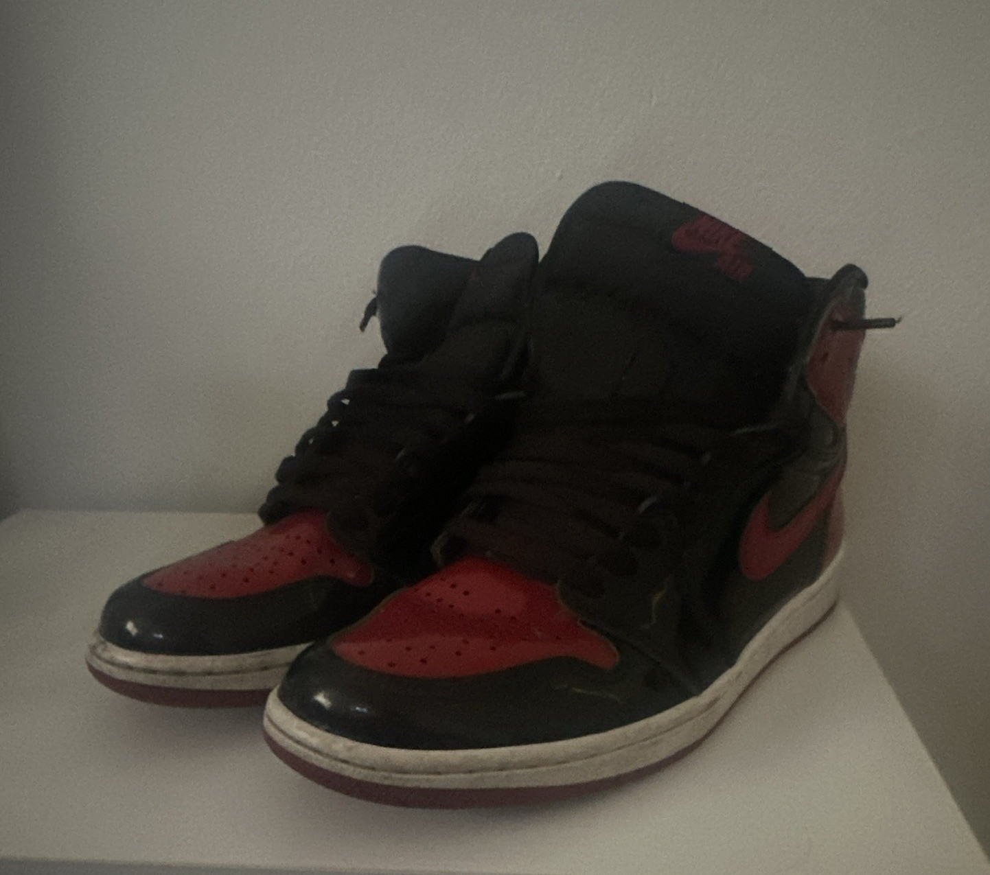 Jordan Air Jordan 1 Men’s High Top Black/Red Colorblock Lace-Up Sneaker