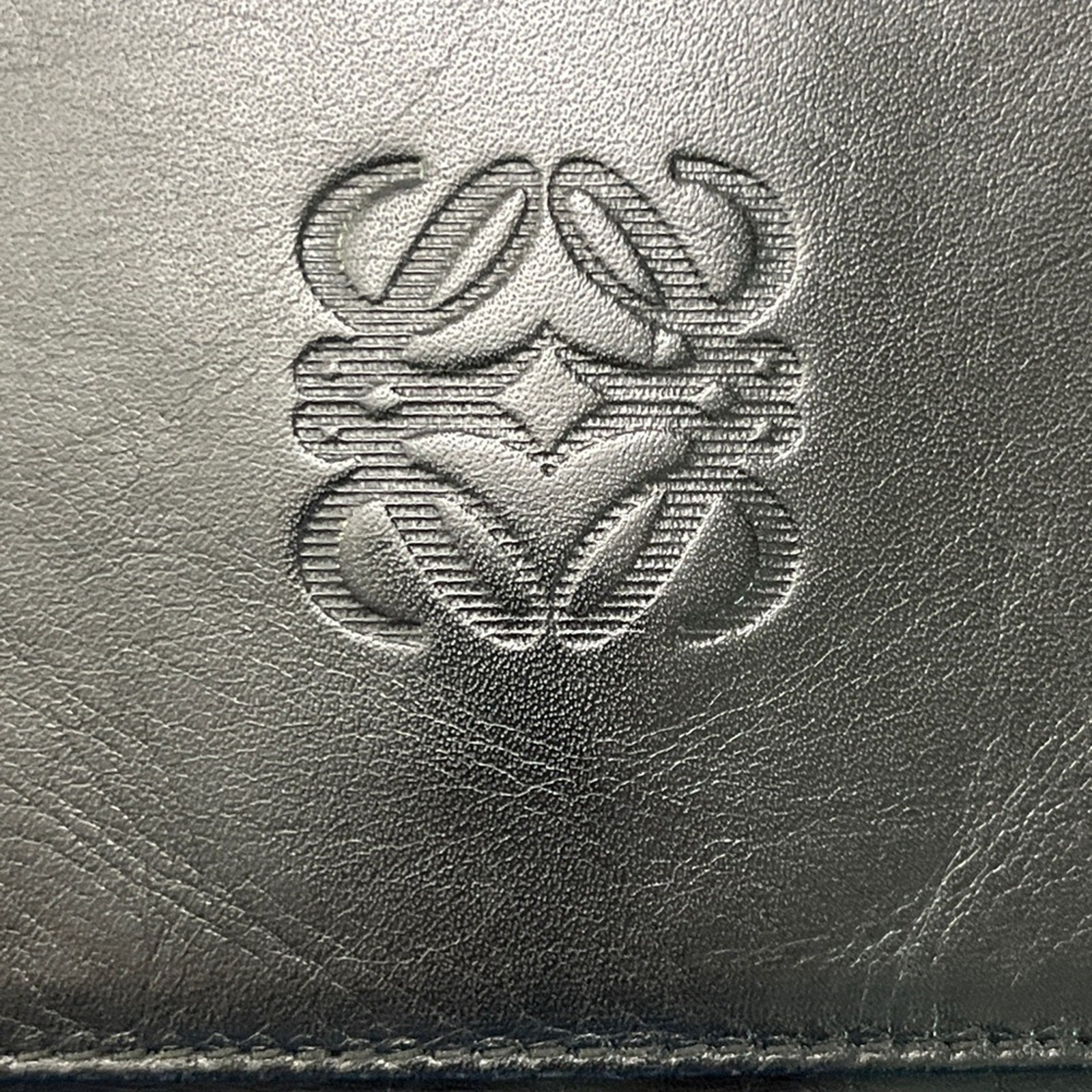 Loewe Anagram Clutch Black Leather Sleek Minimalist Spanish Designer Luxury