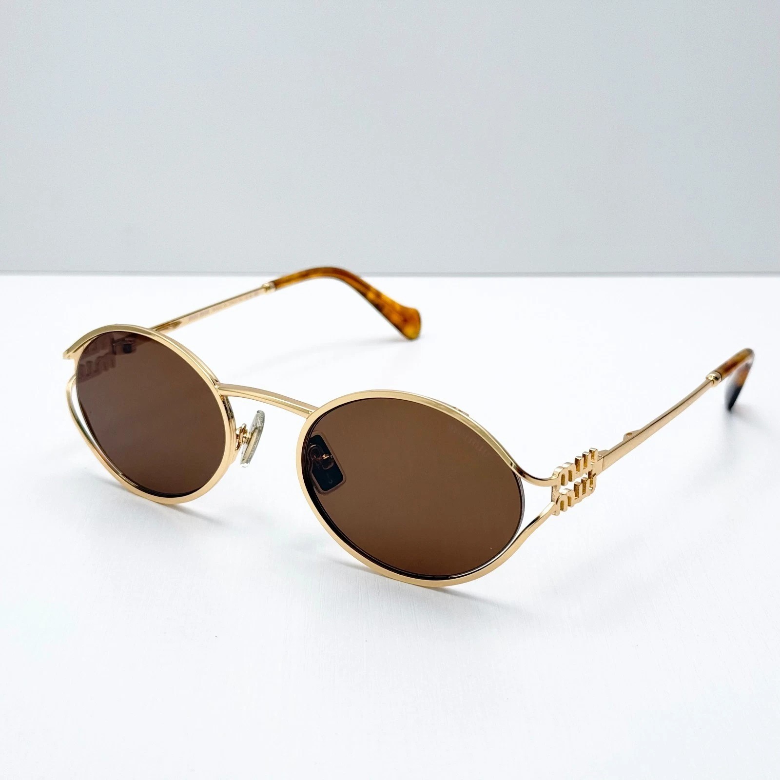 Miu Miu SMU 52YS Gold/Brown Shaded (5AK-06S) Sunglasses