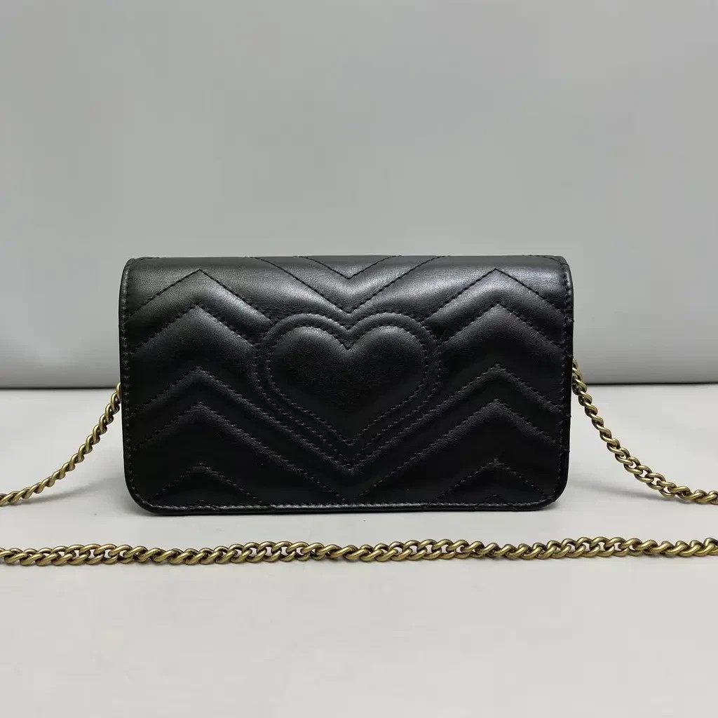 Limited Edition GUCCI Black Quilted Leather, Marmont Animal Studs Mini Purse.