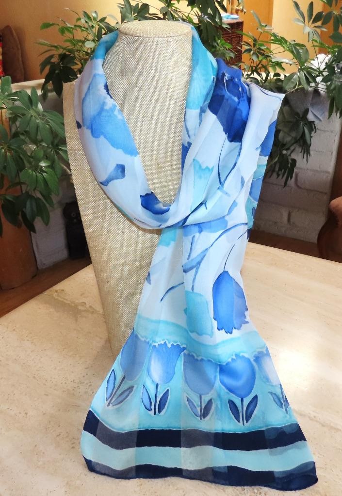 Oblong floral scarf; blue tones, white; 60×14.5 in. Semisheer; poly blend?