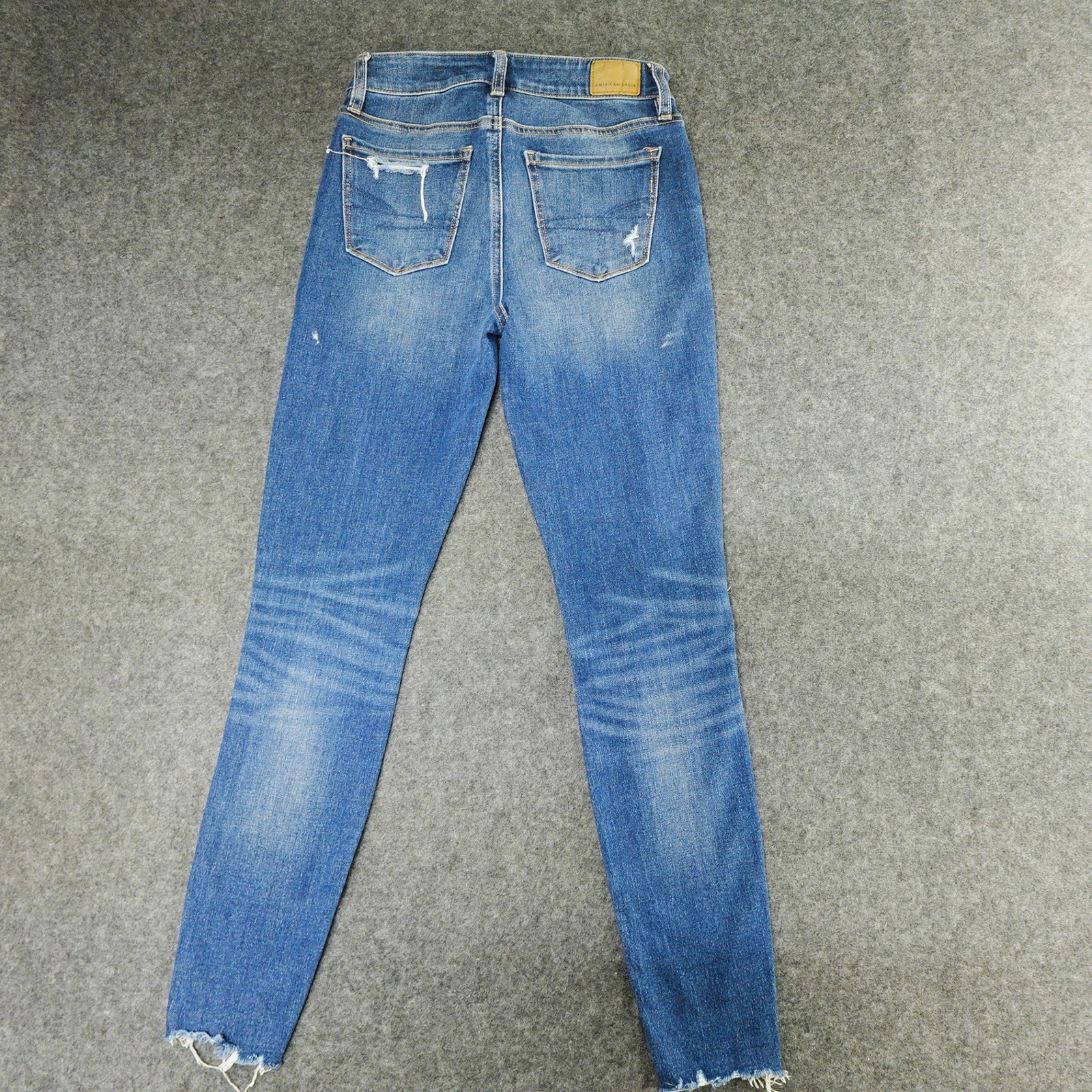 American Eagle Hi-Rise Jegging Distressed Ripped Raw Hem Blue Wash Jeans