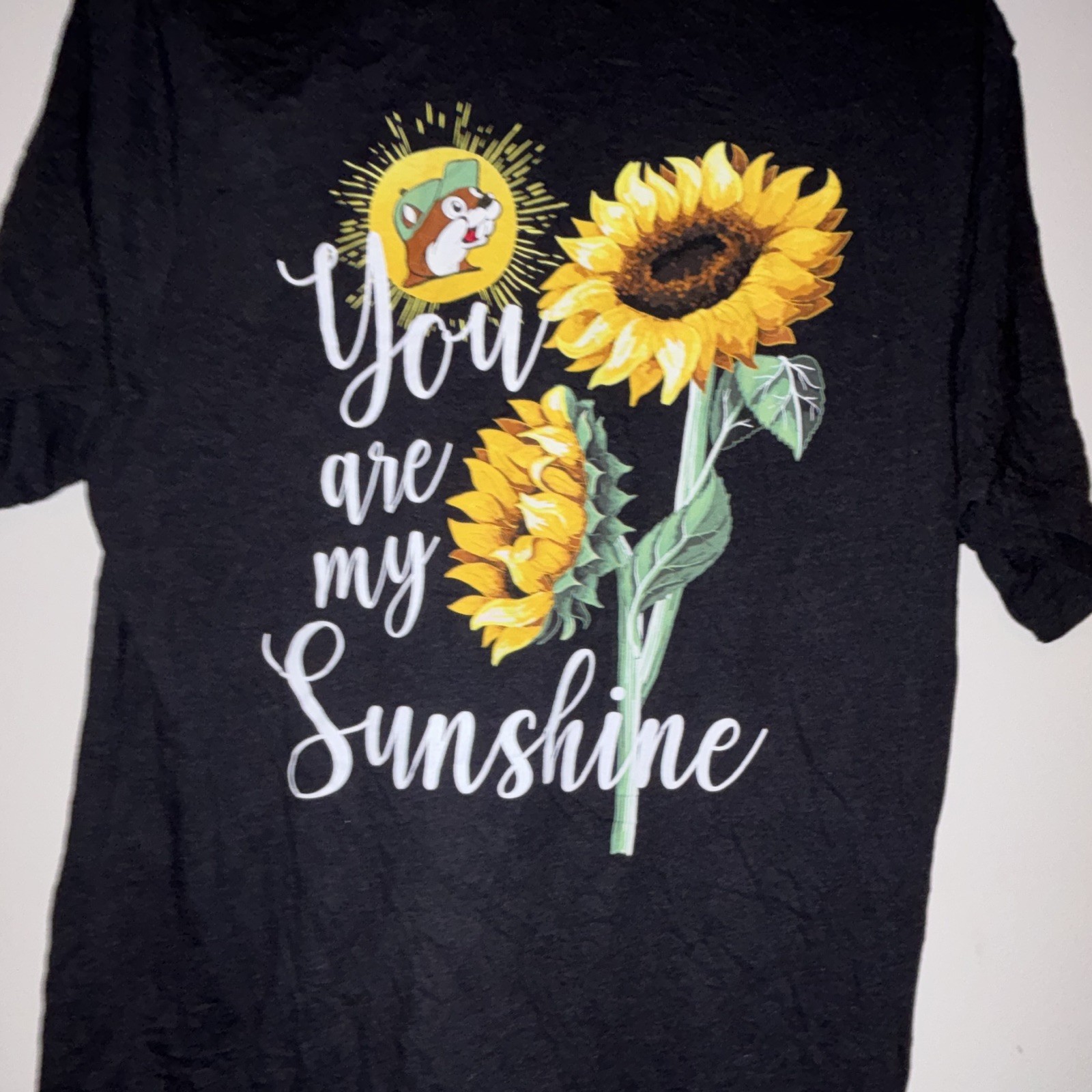 Buc-ee’s Men’s AL Black Sunshine Sunflower Graphic Crew Neck Short Sleeve Tee