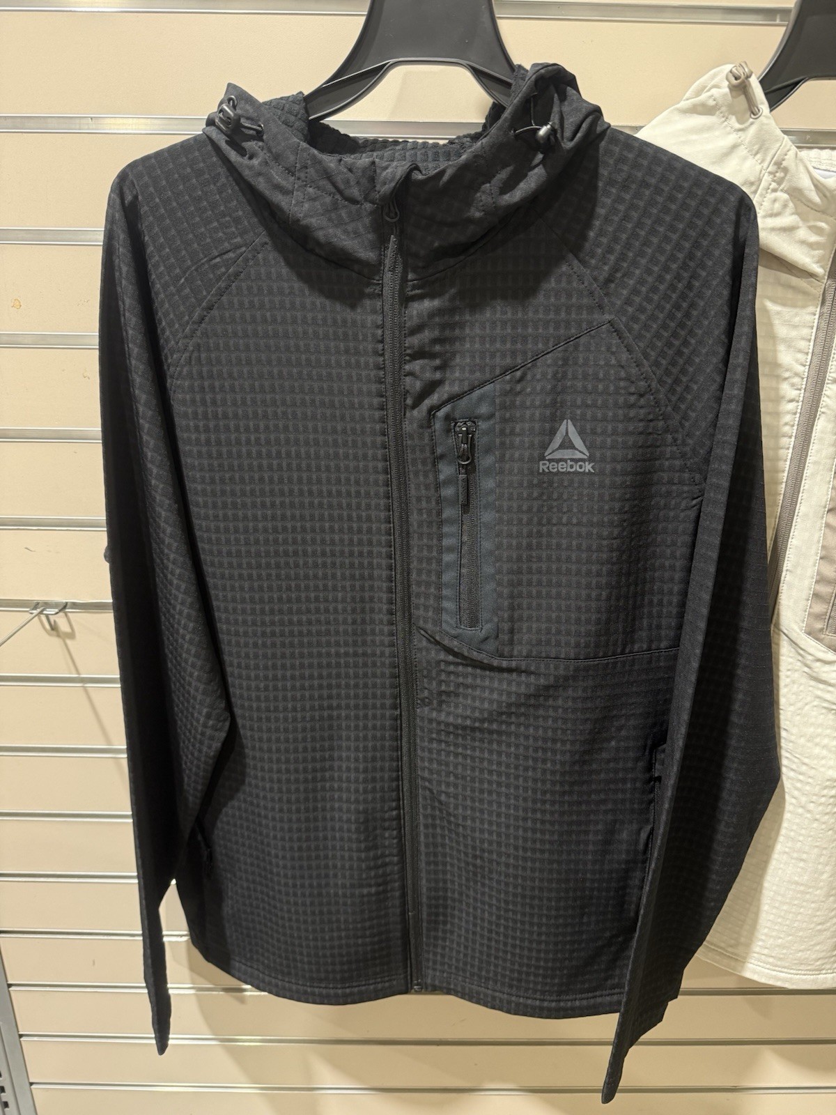 Reebok Men’s Textured Stretch Hooded Jacket, Windbreaker Driftwood Black M-3XL