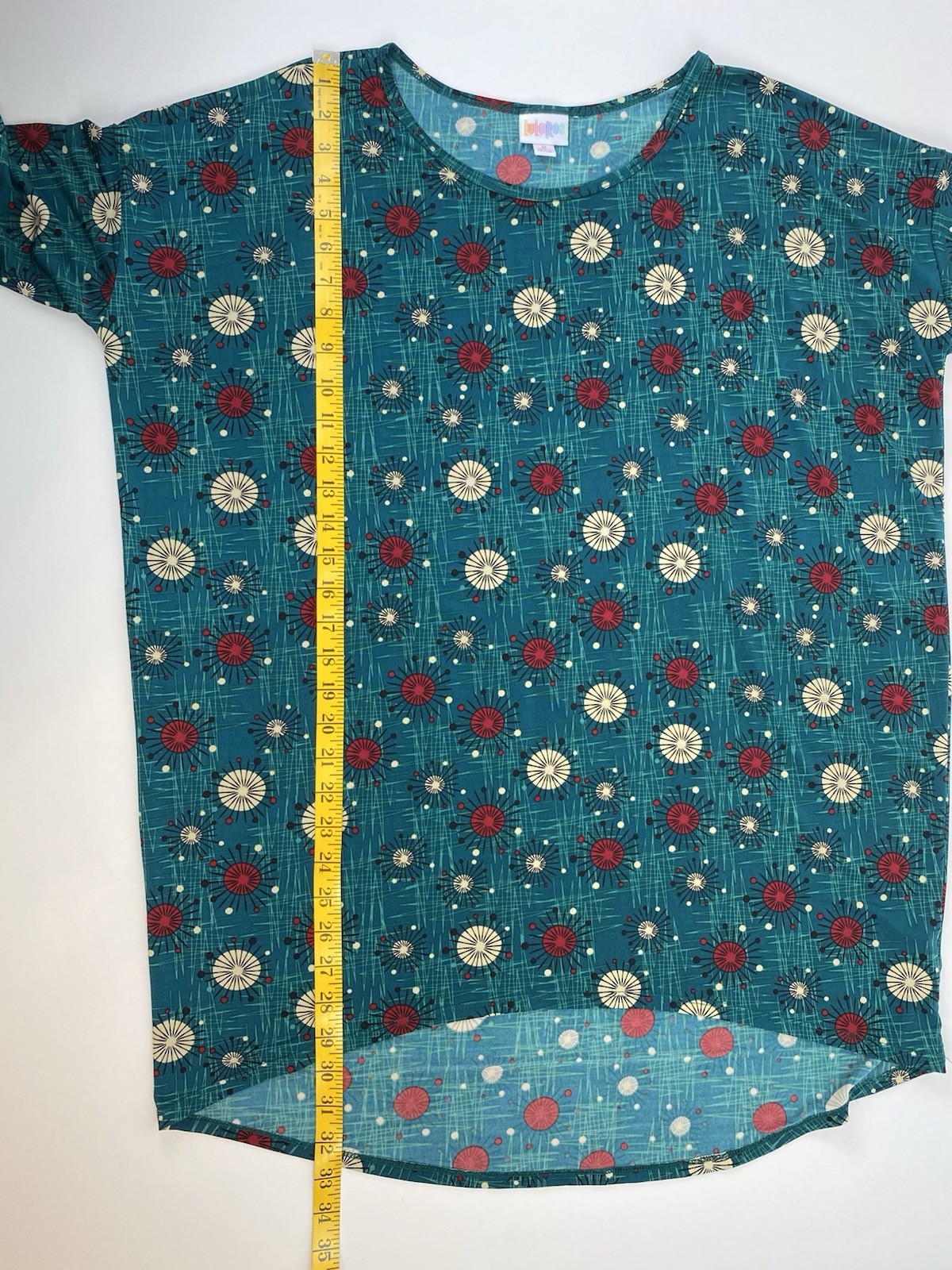 LulaRoe women’s stretch short sleeve green top hi-low measures 3X (see pictures)