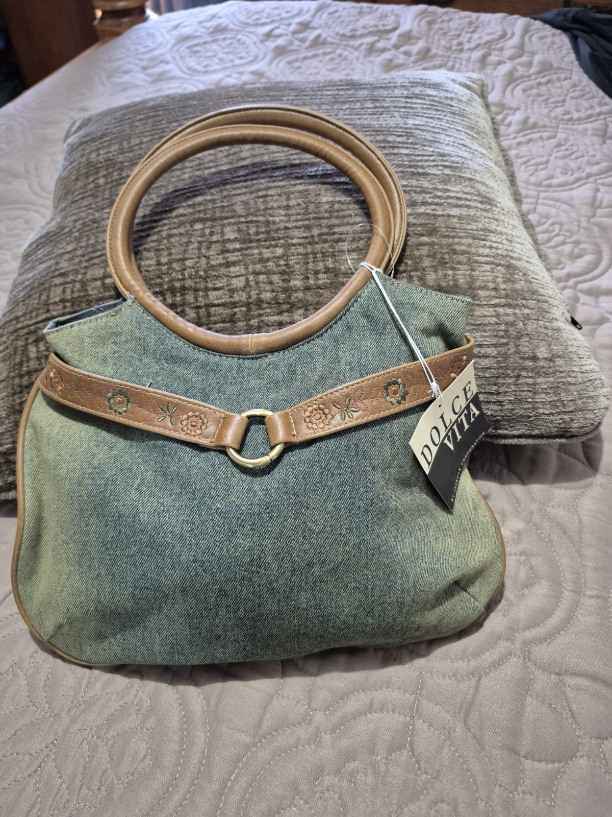 Dolce Vita light blue denim handbag with brown leather accents and floral embroi