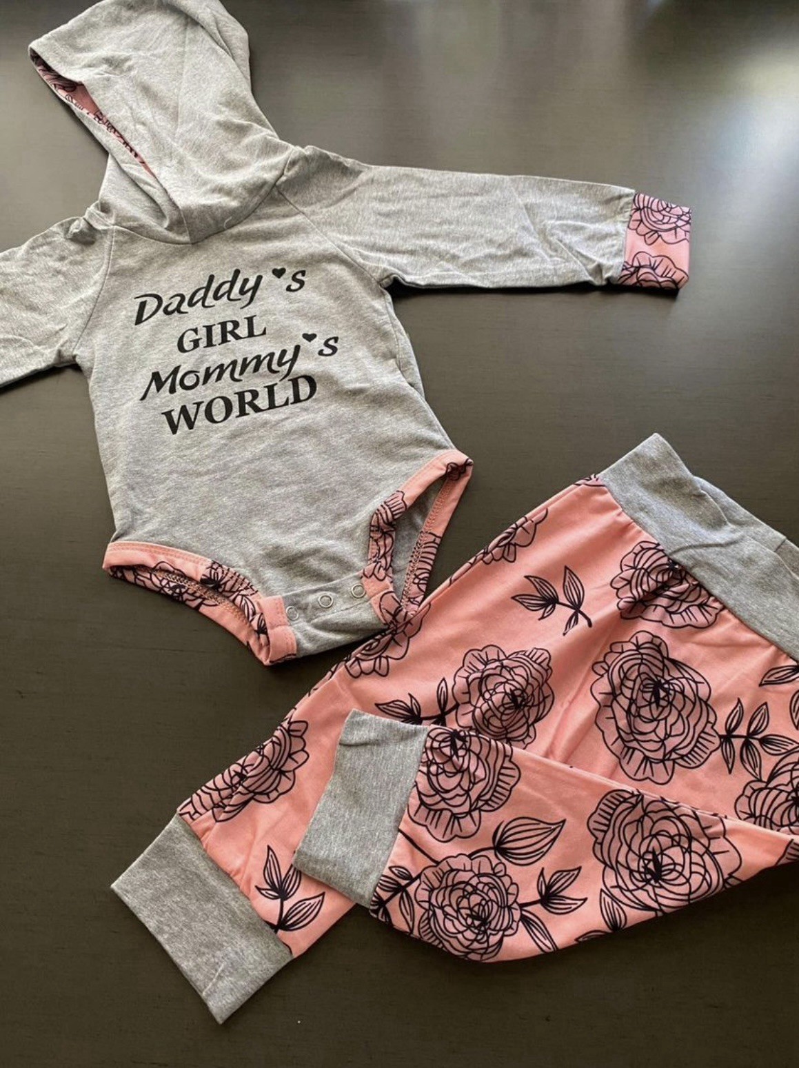 Baby girl outfit: gray hooded romper and pink floral sweatpants, size 3–6 months