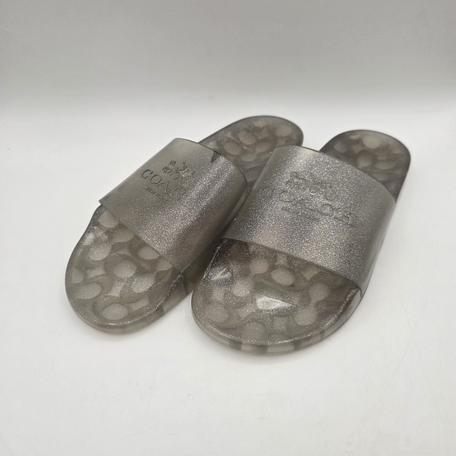 Coach Ulyssa Jelly Clear Slides glitter accent in about a size 10 – 10.5