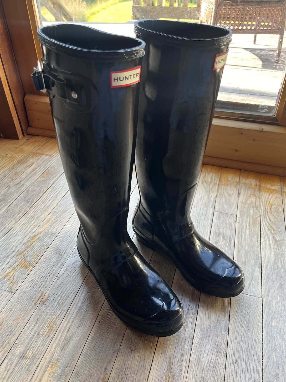 Hunter Women’s Black Knee High Rubber Rain Boots with Buckle Accent