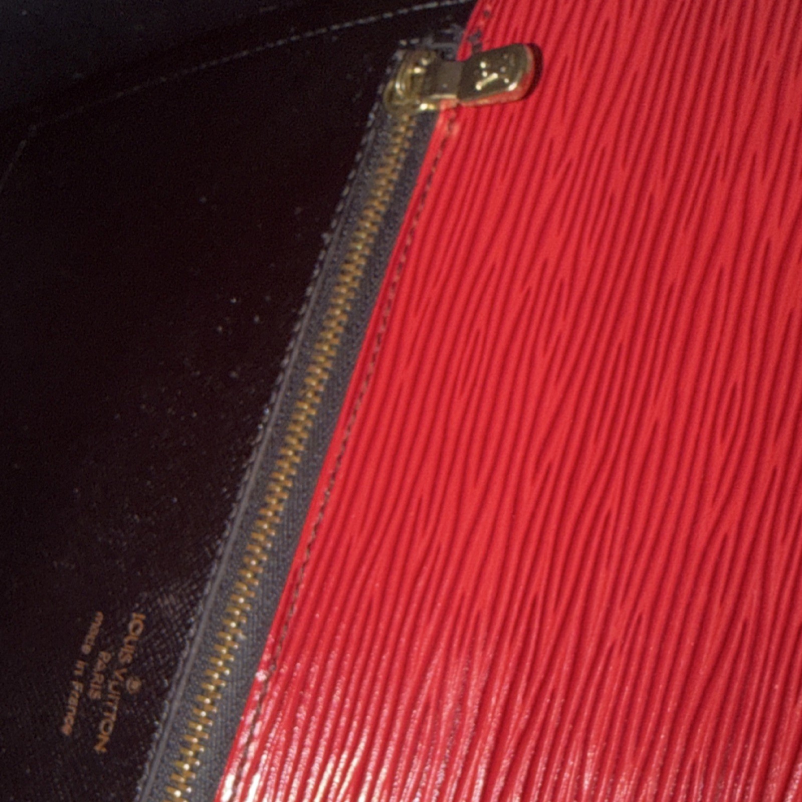 Louis Vuitton Red Epi Monceau 28 Handbag in textured leather/gold-tone hardware