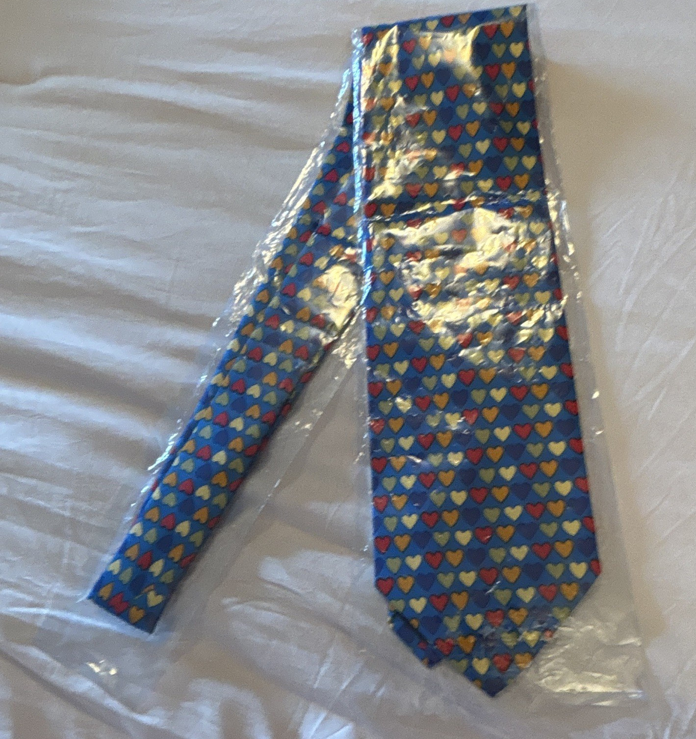 Yves Saint Laurent Blue Woven Silk Heart Pattern Pointed Tie w/ Logo Accent