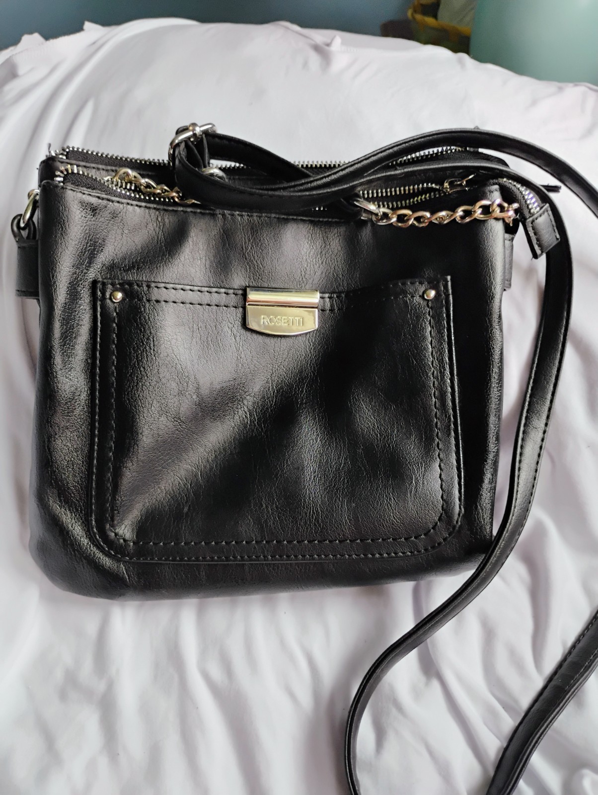 Rosetti Black Crossbody Purse. Zip Top, Chain Strap Accent, Detachable, Pockets
