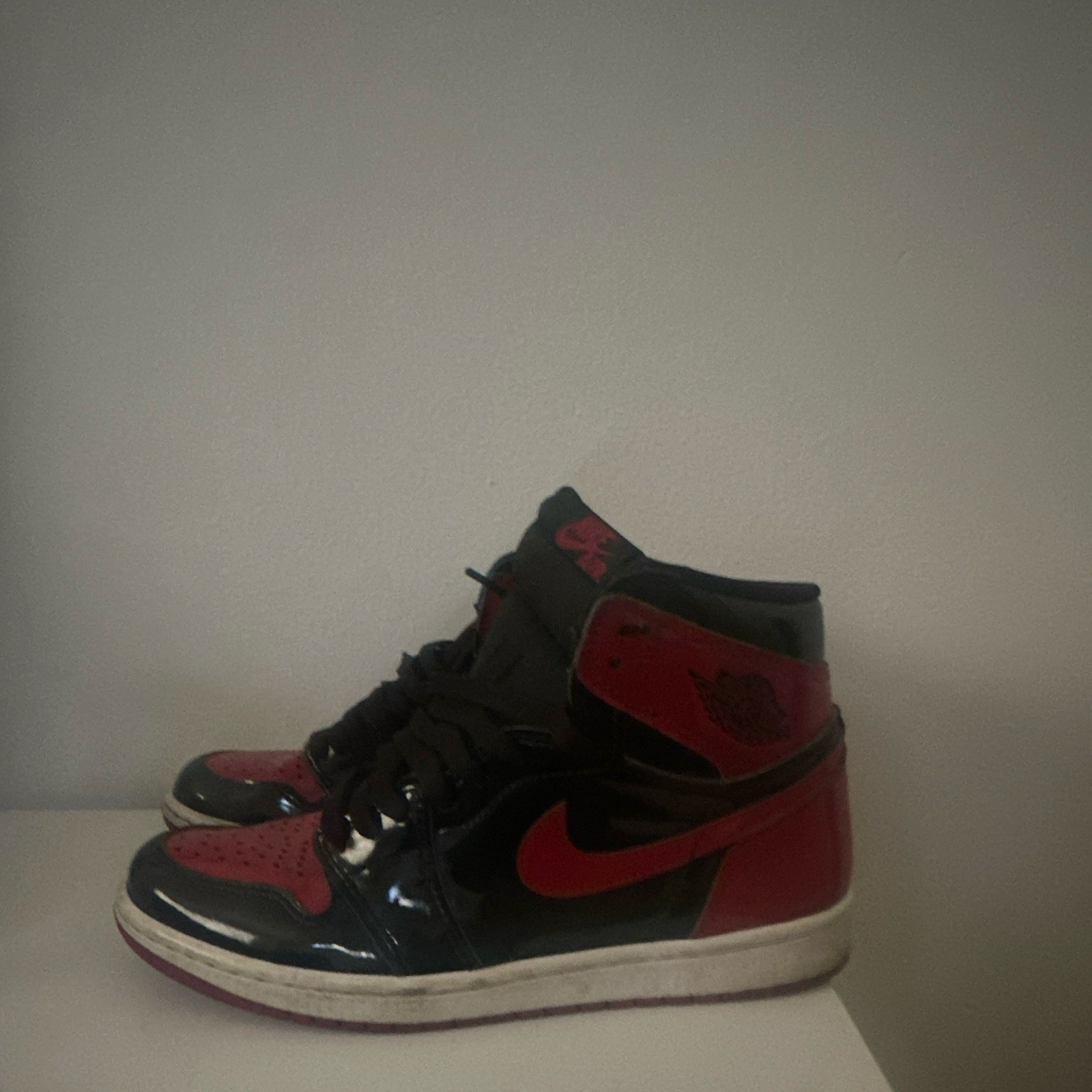 Jordan Air Jordan 1 Men’s High Top Black/Red Colorblock Lace-Up Sneaker