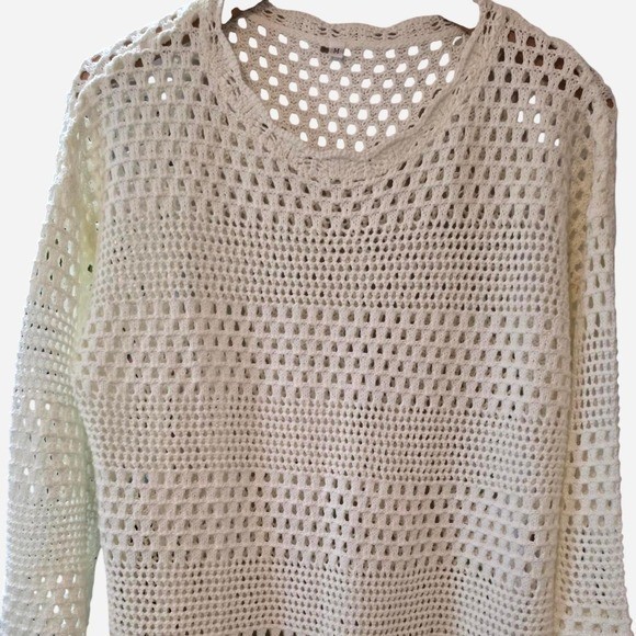 Cream crochet sweater with open knit design