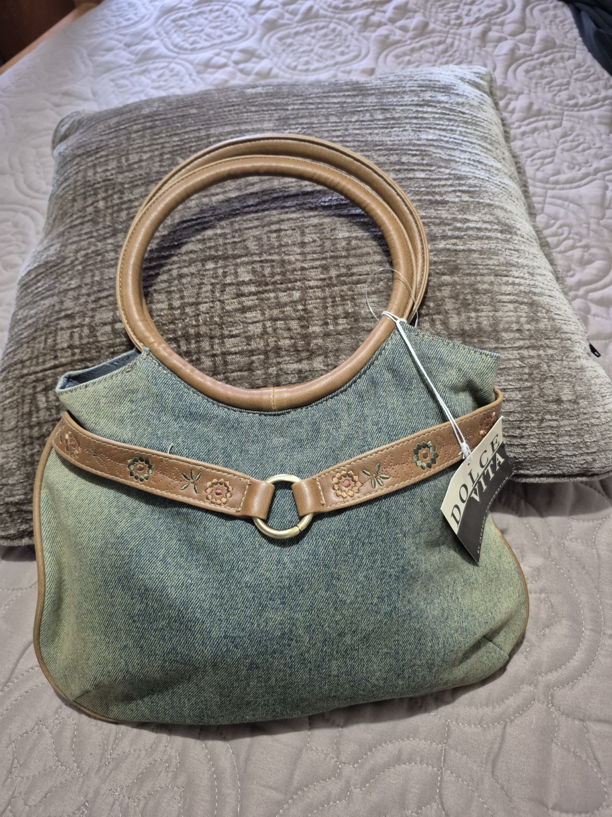 Dolce Vita light blue denim handbag with brown leather accents and floral embroi