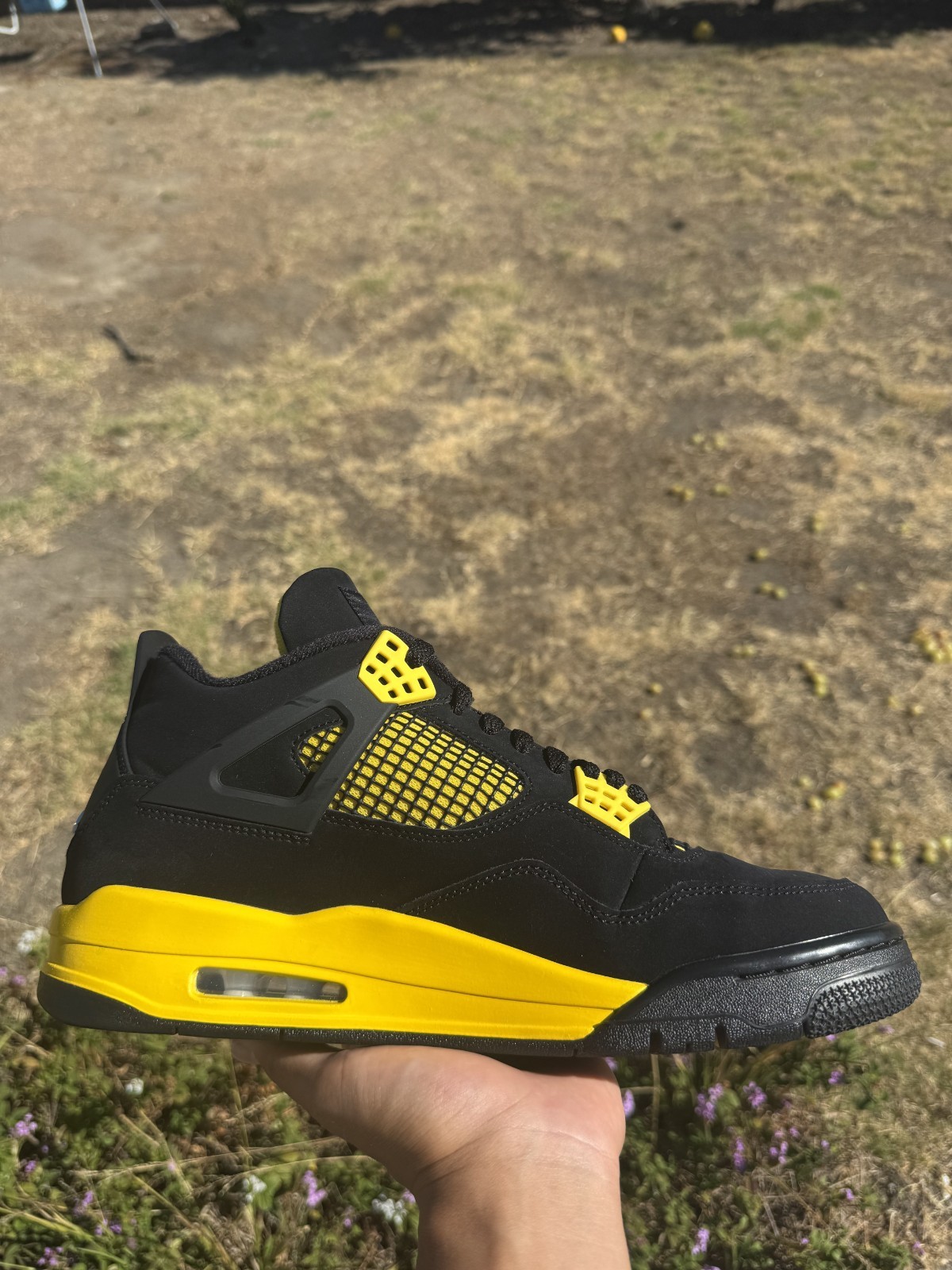 Size 10.5 – Jordan 4 Retro Mid Thunder
