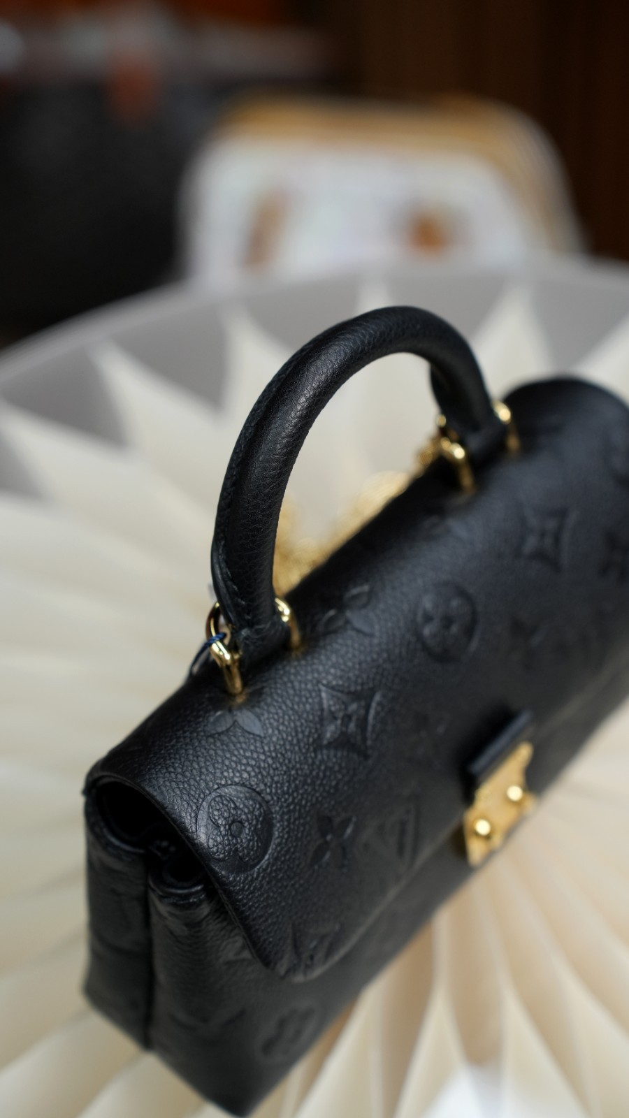 LOUIS VUITTON Madeleine Monogram Empreinte Top Handle Chain Shoulder bag Women