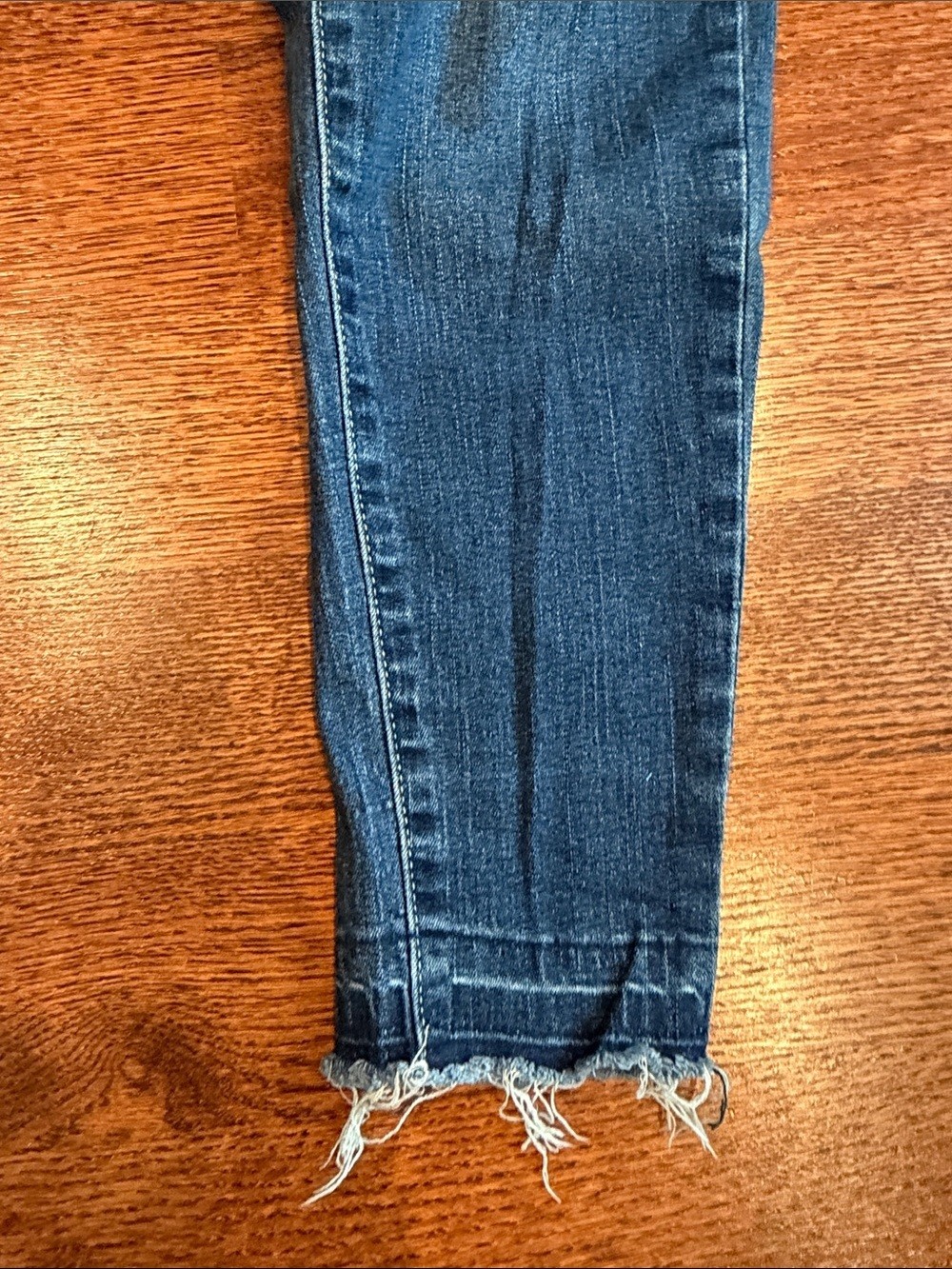 Distressed Blue Skinny Jeans with Raw Hem