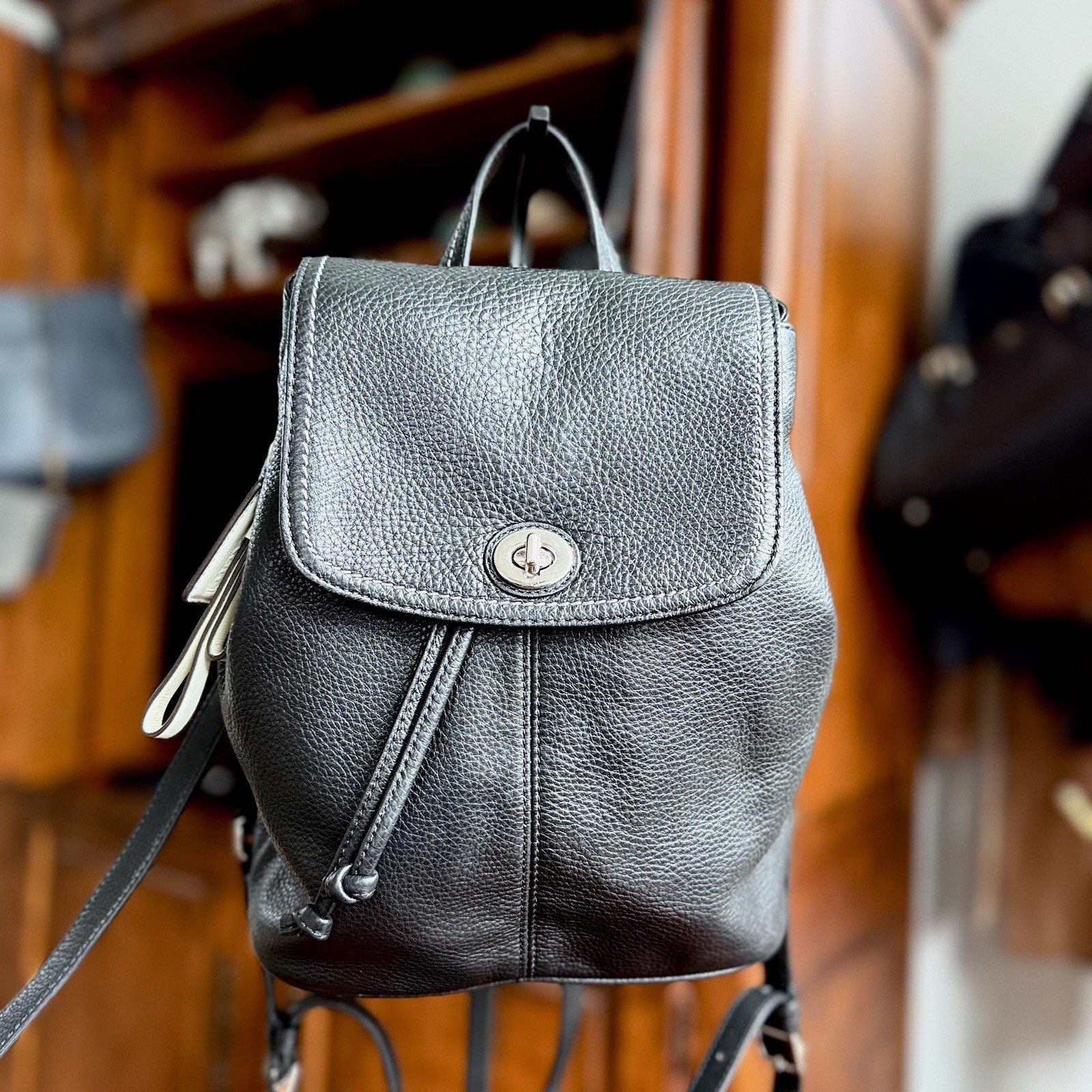 Coach F24385 Black Pebbled Leather Turnlock Drawstring Backpack